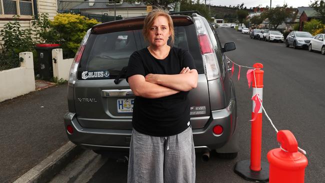 Jillian Mundy North Hobart resident is unhappy that the Hobart City Council has began painting parking spaces onto Strahan Street reducing the amount of actual spaces available. Picture: Nikki Davis-Jones