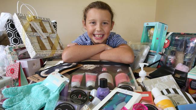 Minto resident Tia Brennen, 10, with presents that she will use to create Mother's Day hampers for patients at the Macarthur Cancer Therapy Centre. Picture: Robert Pozo