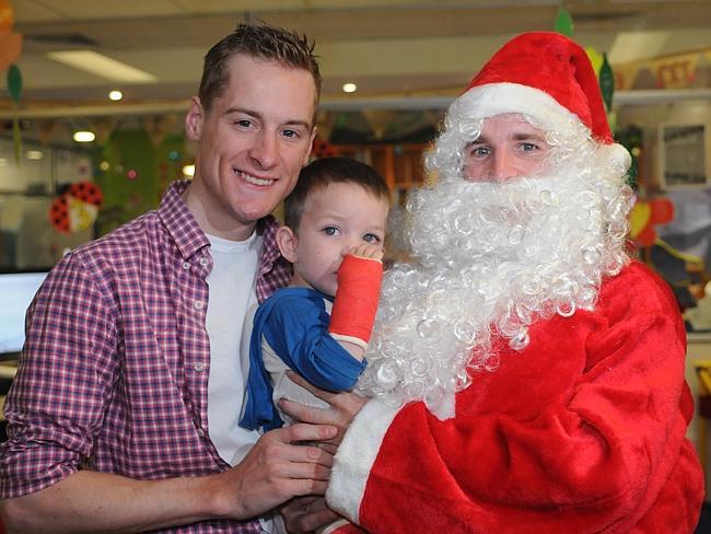 Nathan Berry spreads some Christmas cheer at the Sydney Children's Hospital