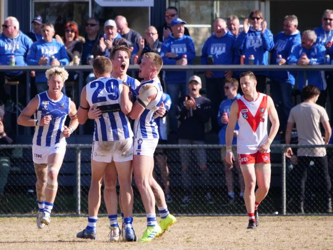 Langwarrin players celebrate a goal against Karingal in the qualifying final on Saturday. Picture: Paul Stan Churcher