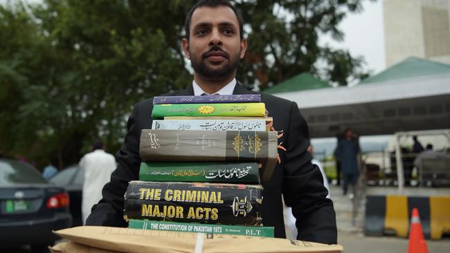 A member of Asia Bibi’s legal team leaves the Islamabad Supreme Court after her final hearing. Picture: AAP.