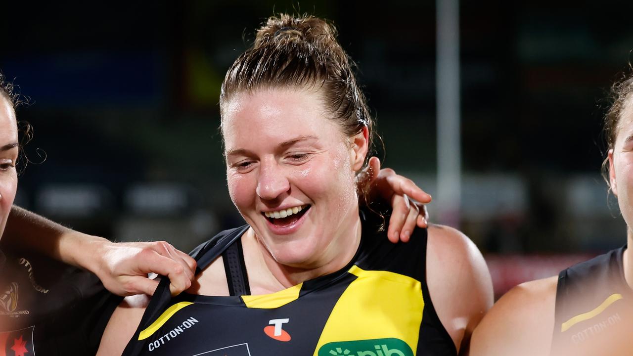 Richmond debutant Tamara Luke celebrates the Tigers’ win over Carlton with teammates at Ikon Park on Thursday. Picture: Dylan Burns / Getty Images