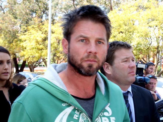 AFL star Ben Cousins leaves a Perth court today. PICTURE: BOHDAN WARCHOMIJ.