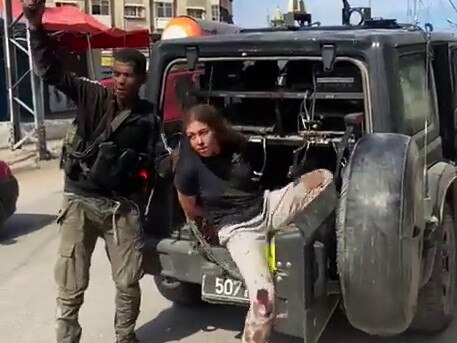 A still taken from video appearing on social media purportedly showing an Israeli hostage taken prisoner by Palestinian militants.