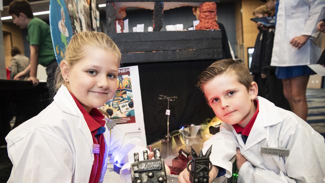 Vale View State School students Sophia Scheid and Corran Marchant with the teams life scanners for Mars display as part of Kids in Space Queensland finals and showcase at Edmund Rice Cultural Centre St Mary's College, Friday, June 7, 2024. Picture: Kevin Farmer