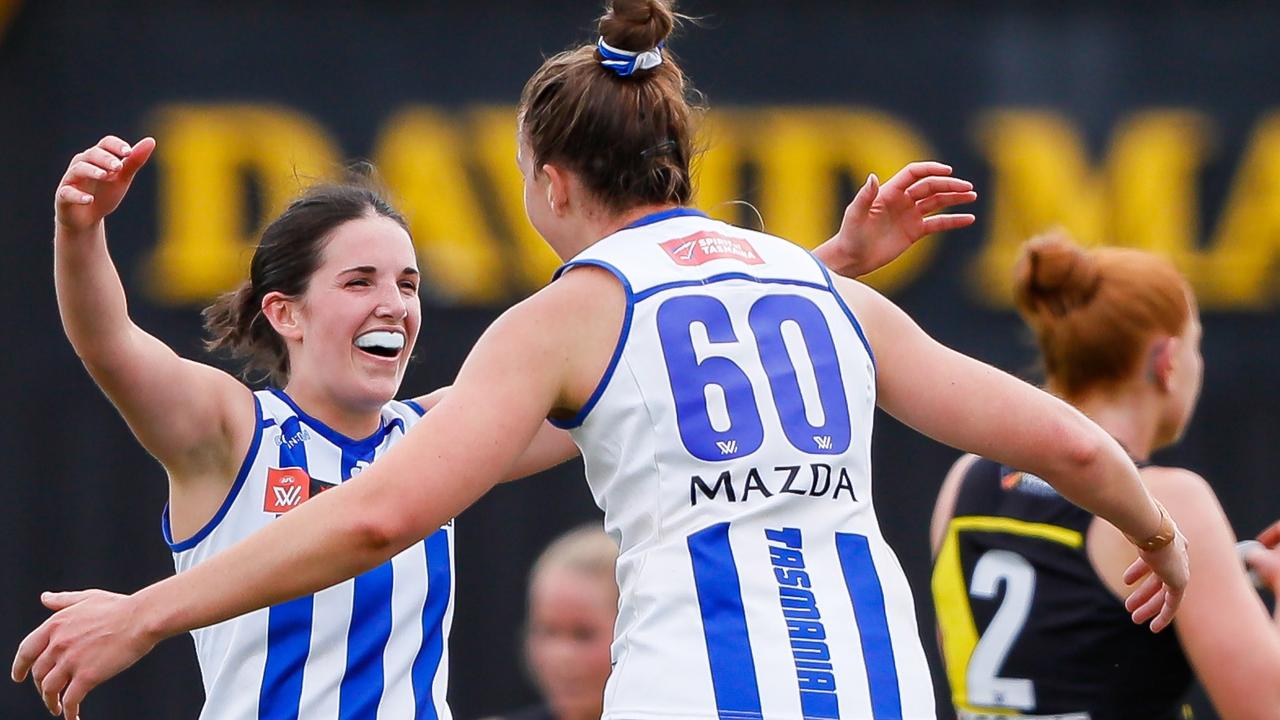 Isabella Eddey and and Emma King rejoice after the final siren. Picture: Dylan Burns/AFL Photos via Getty Images