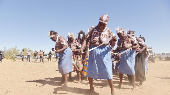 Women perform a purlapa during the 90th anniversary commemoration of the Coniston Massacre at Yurrkuru on Friday, August 24, 2018. Picture: Keri Megelus