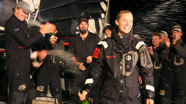 Kristy Hinze celebrates in Hobart wharf after her arrival.