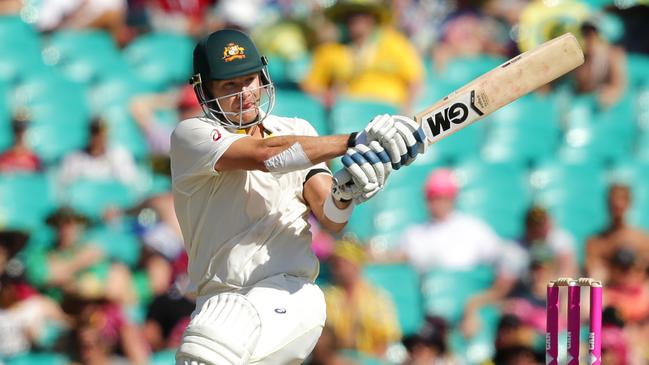 Watson hits a boundary wearing the Baggy Green .Picture Gregg Porteous