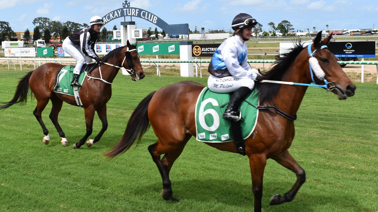 Periodigal ridden by Alisha Donald and Mahkota Rose ridden by Montana Philpot warming up before the 1200M Maiden Plate. Picture: Steph Allen