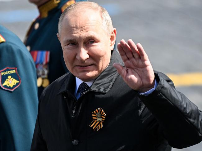 Vladimir Putin leaves Red Square after the Victory Day military parade, where he was observed to be limping. Picture: AFP.