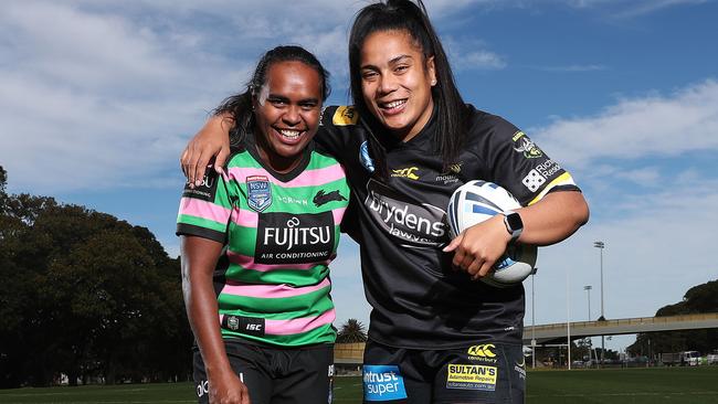 Roosters teammates but NSWRL grand final opposition. Rabbitohs captain Lavina O'Mealey and Mounties captain Simaima Taufa. Pic: Brett Costello