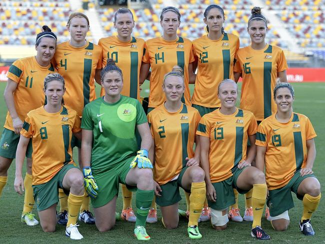 The Matildas pose for a team photo ahead of their clash with Brazil at Queensland Sport and Athletics Centre in 2014. Picture: Getty Images