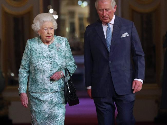 The Queen with son Prince Charles arriving for the formal opening of CHOGM. Picture: AFP/Pool/Jonathan Brady