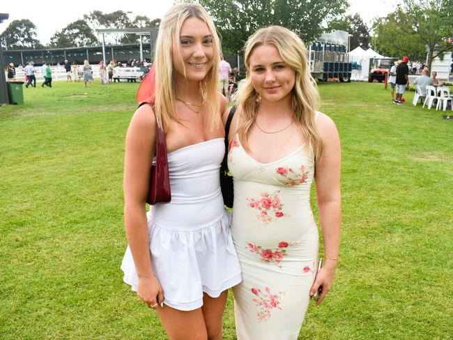 Amy Couch and Lily Agnew enjoying all the action at the Ladbrokes Cranbourne Cup on Saturday, November 23, 2024. Picture: Jack Colantuono