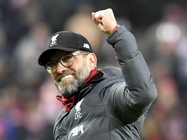 Liverpool's manager Jurgen Klopp celebrates at the end of the group E Champions League soccer match between Salzburg and Liverpool, in Salzburg, Austria, Tuesday, Dec. 10, 2019. Liverpool won 2:0. (AP Photo/Kerstin Joensson)