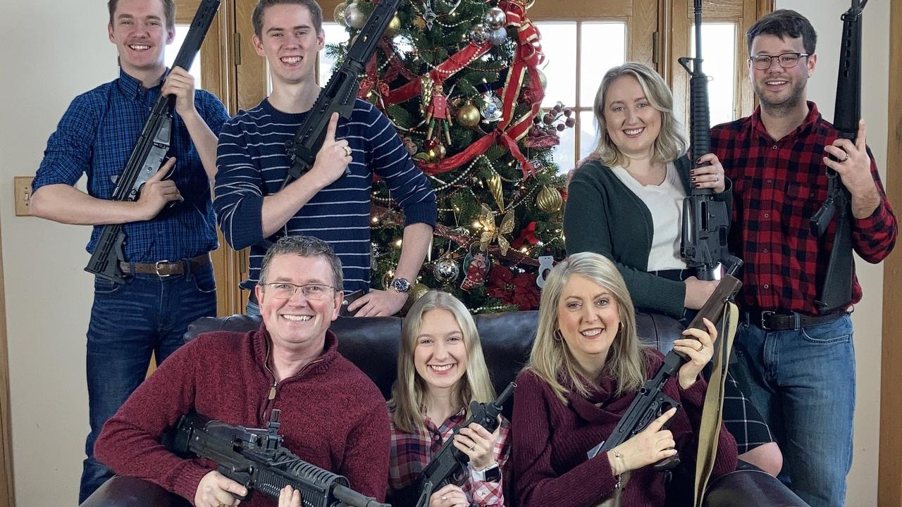 Republican Thomas Massie posted the picture of his family on social media early on Sunday morning. The caption read: “Merry Christmas. PS. Santa, please bring ammo”. Picture: Twitter.