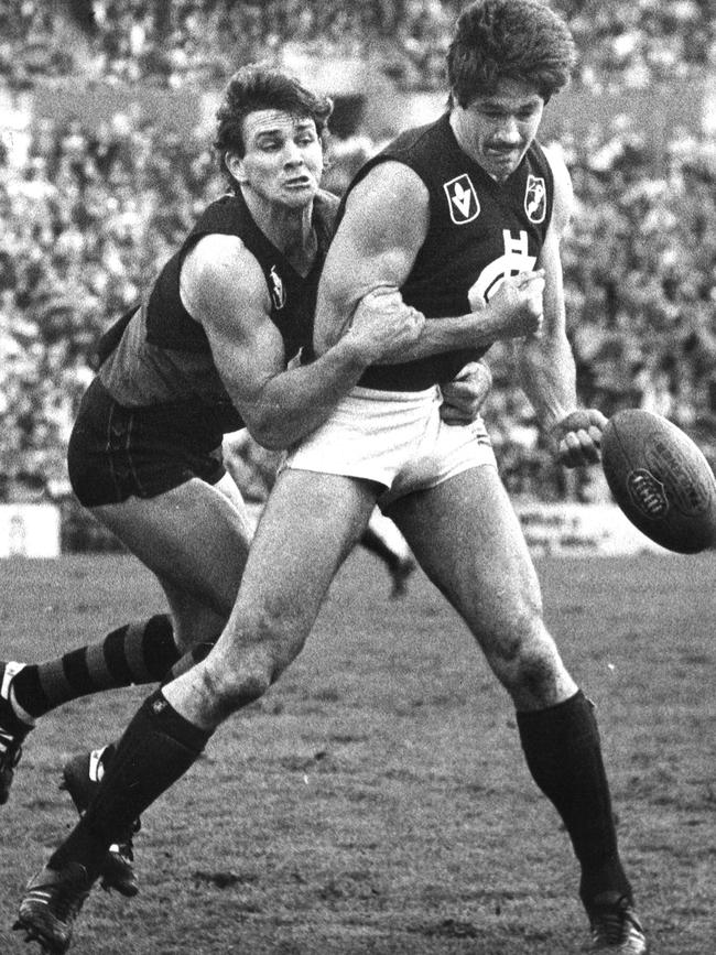 Merv Neagle tackles Carlton great Mike Fitzpatrick.   