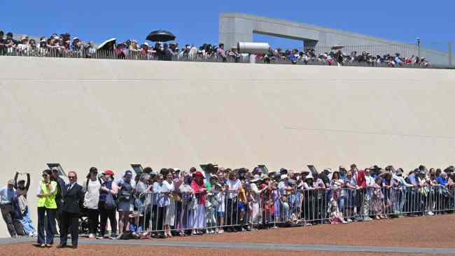 Lines of people could be seen waiting for the arrival of King Charles and Queen Camilla at Parliament House in Canberra. Picture: MICK TSIKAS / POOL / AFP