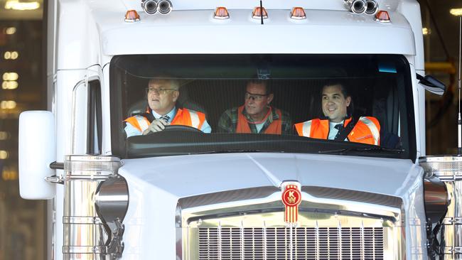 Prime Minister Scott Morrison behind the wheel at PACCAR in Bayswater, Melbourne. Picture: NCA NewsWire / David Crosling