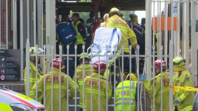 Rescue ... Teams of firefighters enter Richmond station. Picture: TNVA witness to the train crash described how passengers were sent flying through the carriage “like Superman” when <a href="https://www.dailytelegraph.com.au/news/nsw/train-hits-barricade-at-richmond-passengers-injured/news-story/622953ac0a4d3603b06440e78e8ea50d">it hit a buffer at the station</a>. Local resident Noel Keogh said: “I heard the train come in fast. I didn’t hear any brakes. I saw it hit the barrier and the ground shook,” he told The Daily Telegraph.