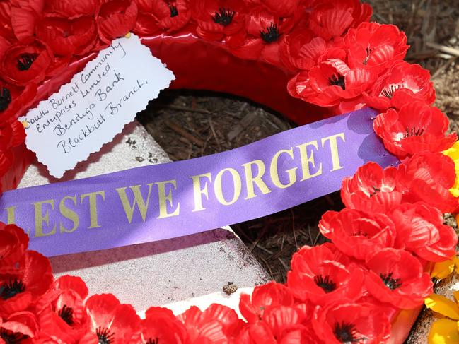 Flowers surrounding the cenotaph at the 2017 Blackbutt Anzac Day event.