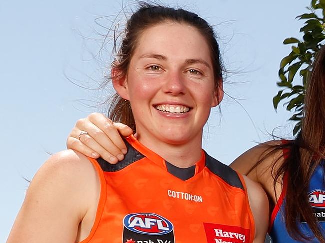 MELBOURNE, AUSTRALIA - OCTOBER 18: (L-R) Jodie Hicks of the Giants, Monique Conti of the Bulldogs, Stephanie Cain of the Dockers, Isabel Huntington of the Bulldogs, Chloe Molloy of the Magpies, Eden Zanker of the Demons, Jordan Zanchetta of the Lions and Jessica Allan of the Crows pose for a photograph during the 2017 NAB AFL Women's Draft at Docklands on October 18, 2017 in Melbourne, Australia. (Photo by Michael Willson/AFL Media/Getty Images)