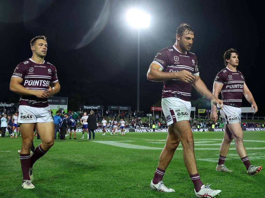 The Sea Eagles look dejected after their shock loss. Picture: Mark Metcalfe/Getty Images