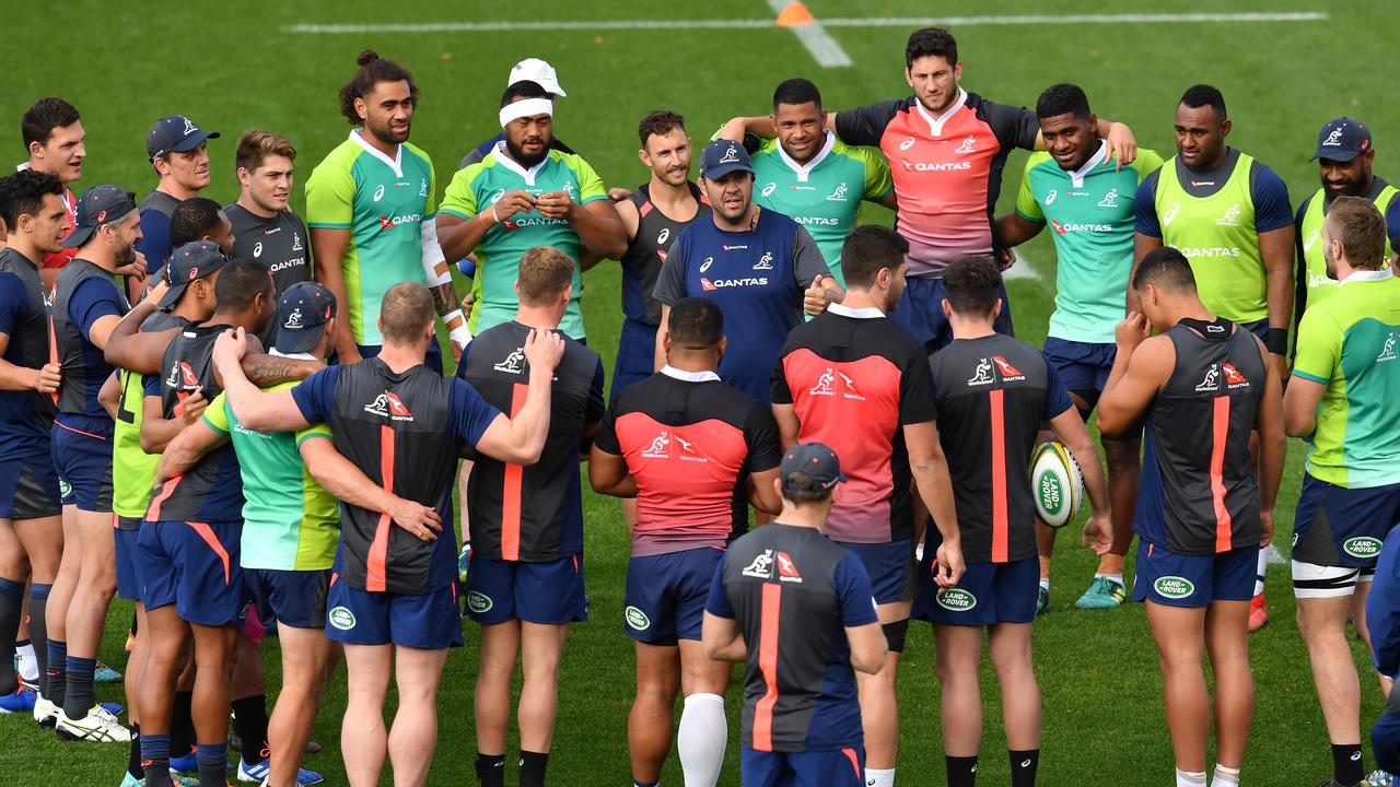 Wallabies coach Michael Cheika is seen with his players during Australian training.