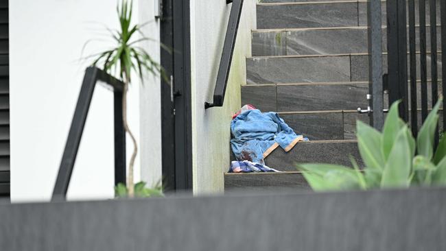 Blood stains outside the home. Picture: Lyndon Mechielsen