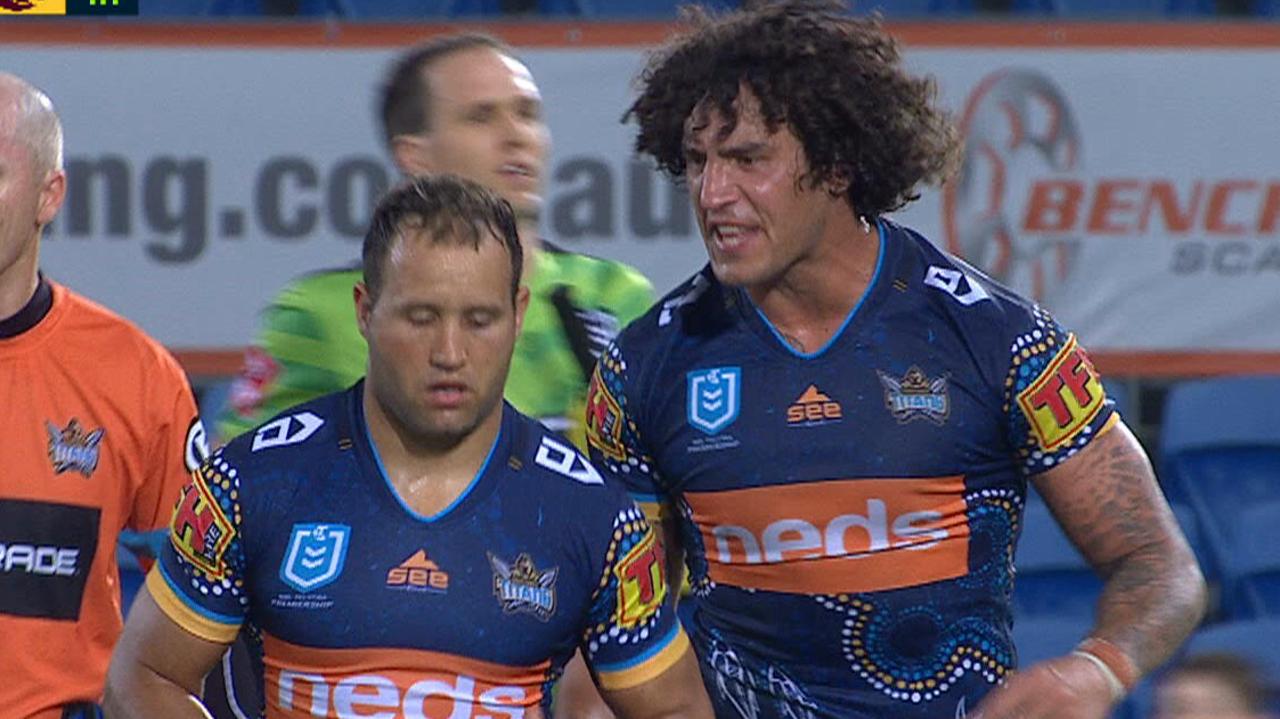 Kevin Proctor sprays his Titans captain Tyrone Roberts at half time.