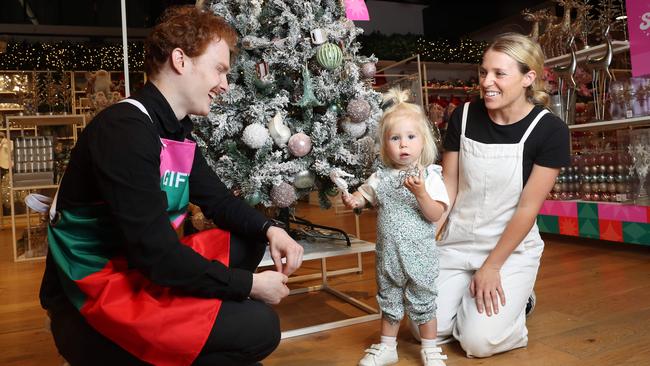 Meghan and her daughter Scarlett Murray with assistant store manager Tate Griffin assistant store manager at the Myer giftorium in Sydney. Picture: John Feder