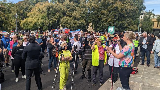 The Let Women Speak rally has moved on to the steps of Parliament House.