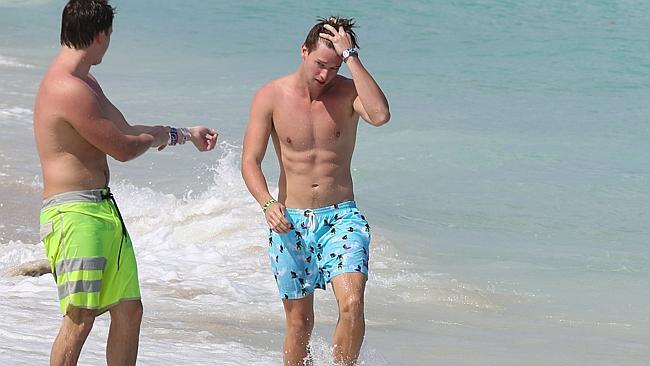 Patrick Schwarzenegger shows off his beach body.