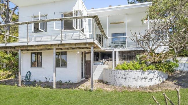 Homeowners in Point Lookout have some of the highest mortgage debt in Queensland, according to new figures. This house at 29 Yarrong Rd, Point Lookout, is for sale.