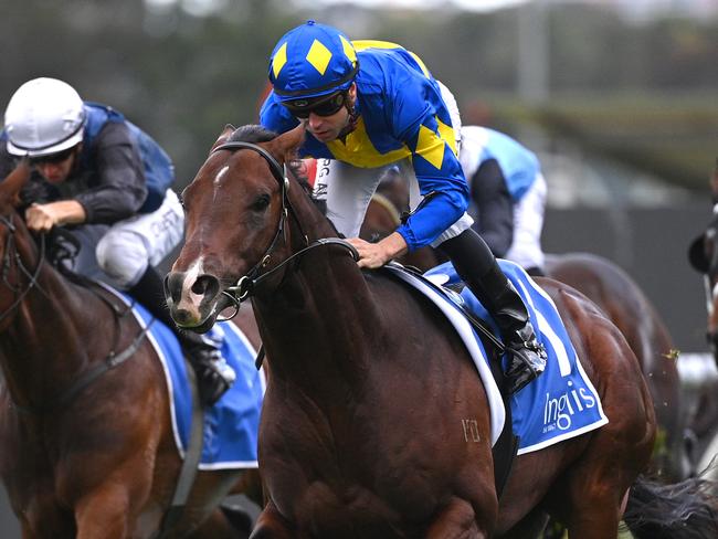 Jockey Adam Hyeronimus rides Dawn Passage (second left) to victory in race 4, the Inglis 3YO Guineas, during the Scone Inglis Guineas at Rosehill Gardens Racecourse in Sydney,Saturday, May 16, 2020. (AAP Image/Dan Himbrechts) NO ARCHIVING, EDITORIAL USE ONLY