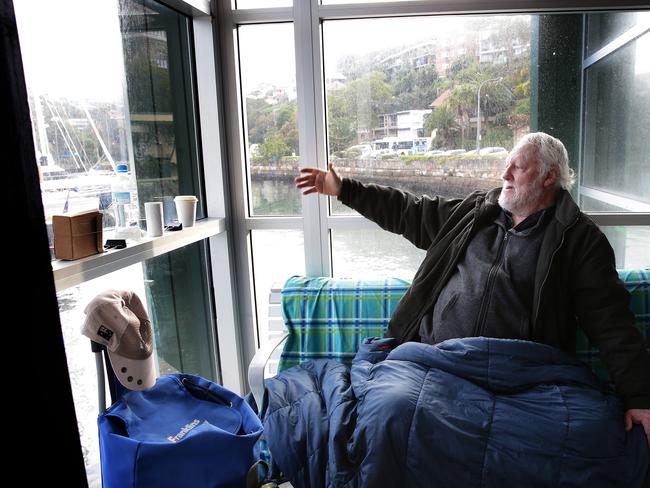 Mr Johnson shows off the great view from his bench at the wharf.