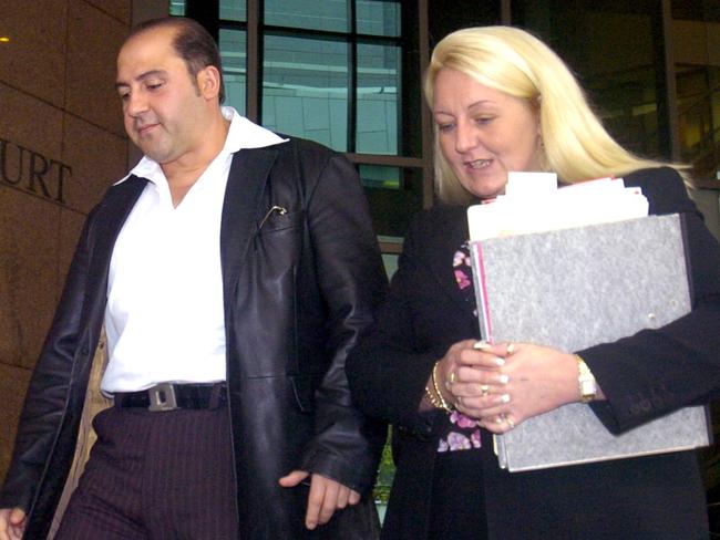 Tony Mokbel  leaves Melbourne Magistrates Court with his lawyer, Nicola Gobbo.