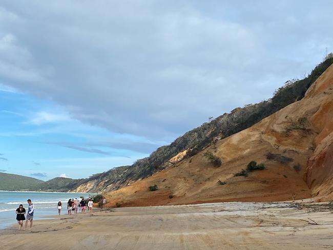 Landslide cleared at Qld tourist beach after 70m+ cliff collapses