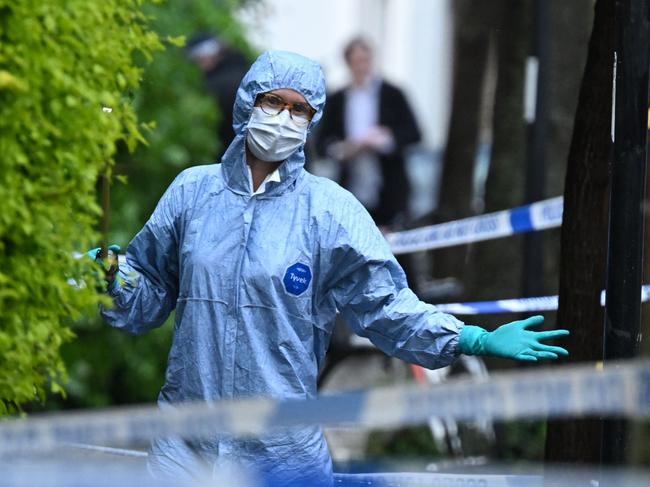 LONDON, ENGLAND - MAY 12: Police forensics officers seen near the home of UK Prime Minister Sir Keir Starmer on May 12, 2025 in London, England. An investigation is underway after a fire broke out in the early hours of Monday morning at a property owned by Prime Minister Keir Starmer in north London. The doorway to the home was damaged, but no injuries were reported. Starmer and his family currently reside at the prime minister's official residence at Downing Street in central London. (Photo by Leon Neal/Getty Images)
