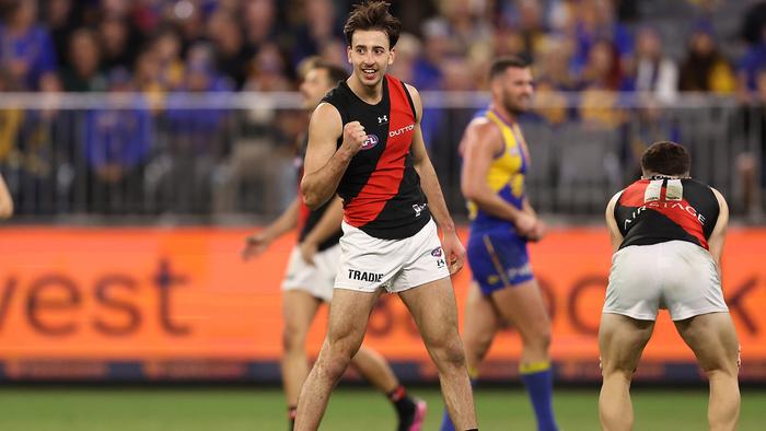 PERTH, AUSTRALIA - MAY 04: Nic Martin of the Bombers celebrates winning the round eight AFL match between West Coast Eagles and Essendon Bombers at Optus Stadium, on May 04, 2024, in Perth, Australia. (Photo by Paul Kane/Getty Images)