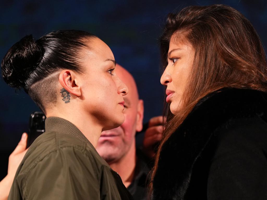 Raquel Pennington (L) faces off with Mayra Bueno Silva (R) ahead of their bantamweight title fight. Picture: Getty Images