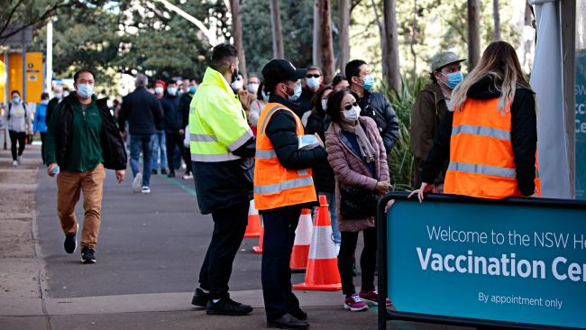 Residents line up at Sydney's mass vaccination hub in Sydney Olympic Park during lockdown