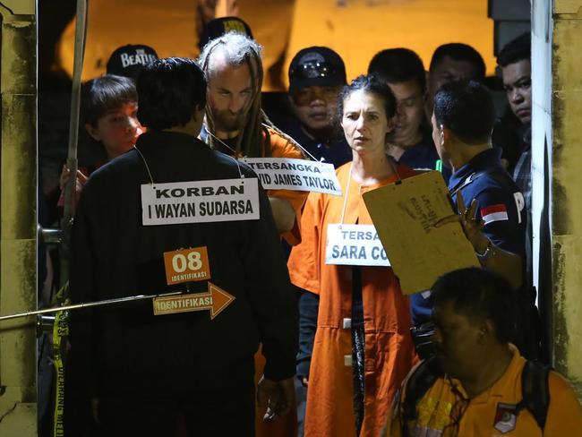 Byron Bay mum Sara Connor and her British boyfriend David Taylor looking distressed as they arrive at Kuta Beach for the re-enactment exercise. Picture: Zul Edoardo.