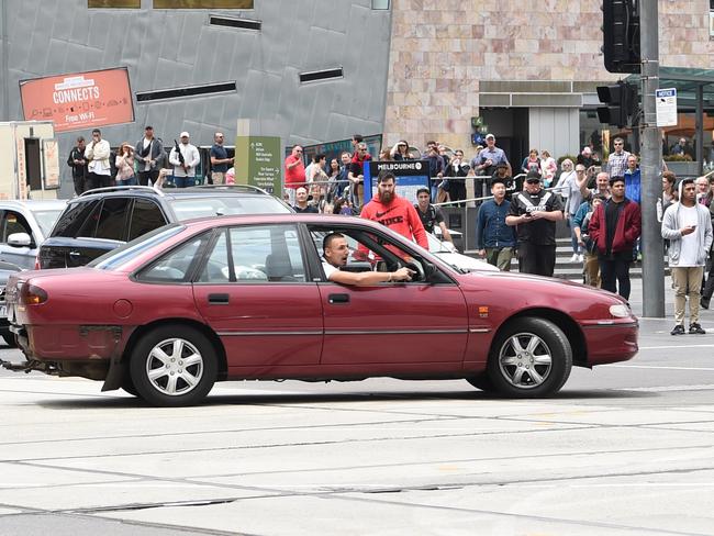 Driver the drove his car up Swanston st and then collected pedestrians down Bourke St, Melbourne. Picture, Tony GoughDimitrious Gargasoulas