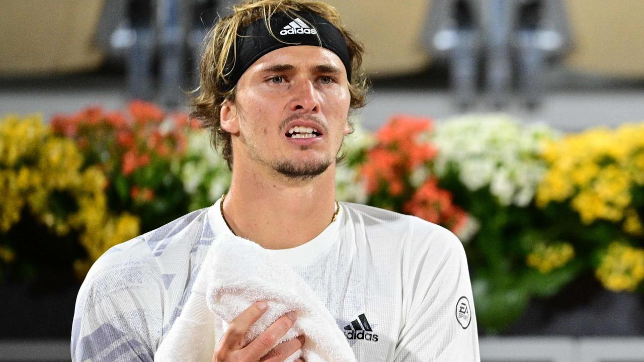 Germany's Alexander Zverev uses a towel during a break at Roland Garros.
