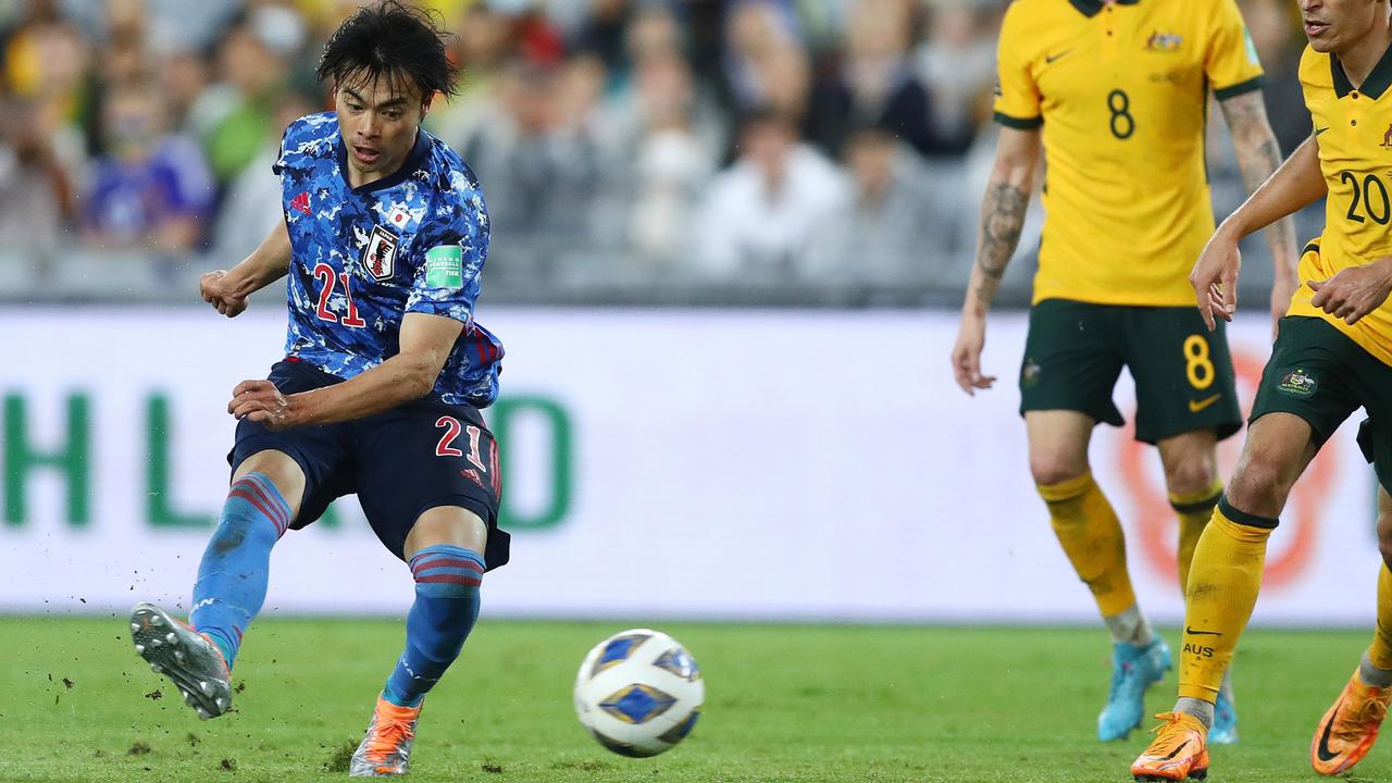 Kaoru Mitoma of Japan scores a goal during the FIFA World Cup Qatar 2022 against Australia. Picture: Mark Metcalfe/Getty Images