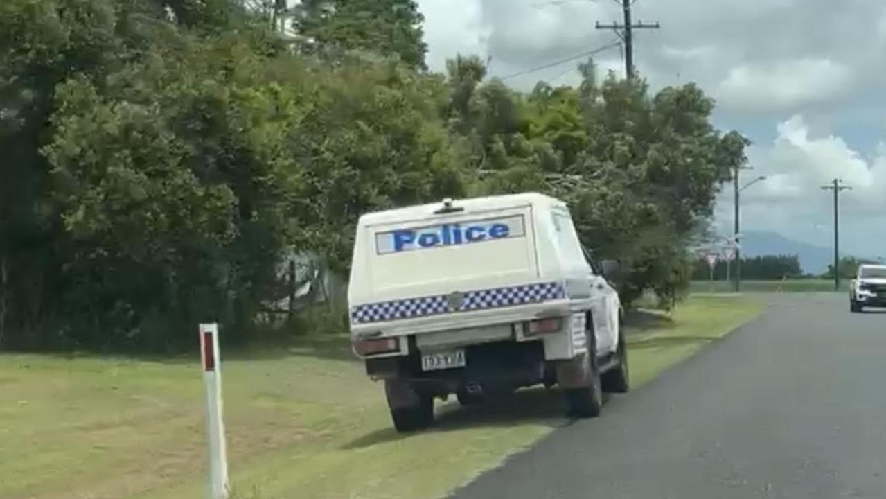 A police vehicle on Martyville Rd, Martyville - south of Innisfail where a man in his 20s was found dead on December 25. Picture: Supplied