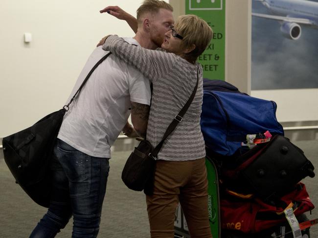Stokes gets a hug and kiss from his mum Barbara on his arrival in Christchurch.