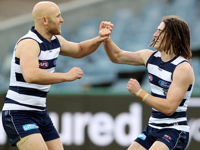 The little master celebrates kicking a goal with Gryan Miers. Picture: Michael Klein